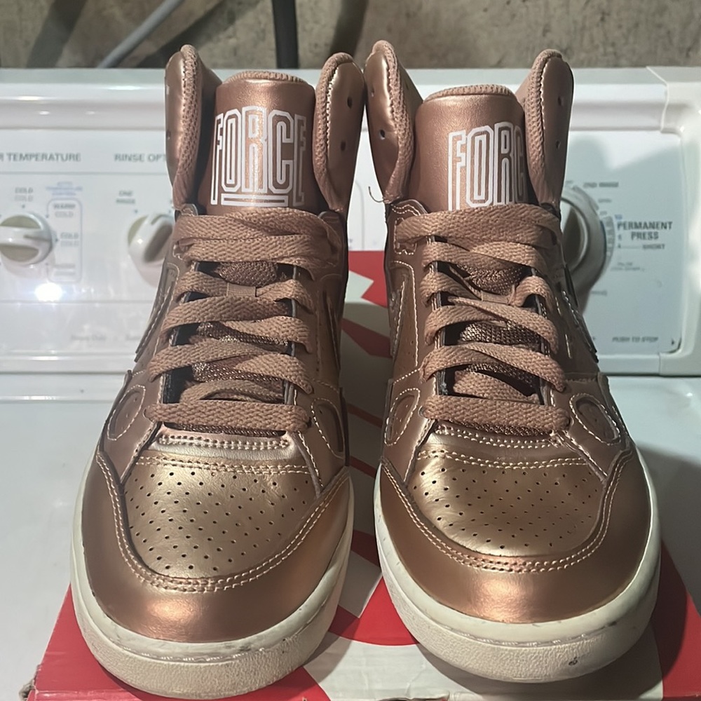 Nike Women’s High-Top Sneakers in Metallic Rose